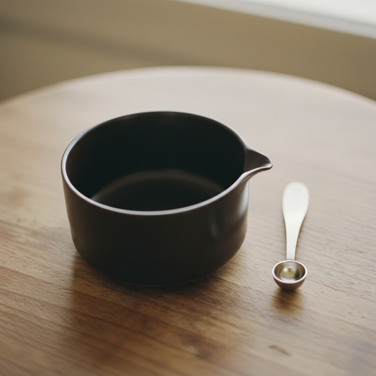 Matcha bowl and metal spoon close-up